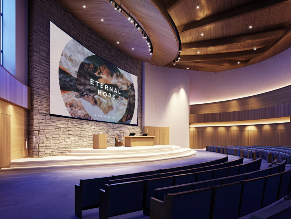 A well lit church sanctuary with a large LED video wall.